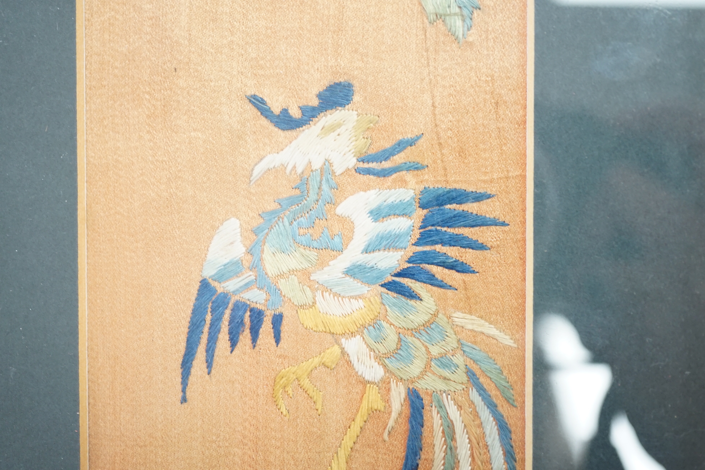Two Chinese hardwood and mixed soapstone panels and a silk embroidered panel, largest 14.5cm x 29.5cm high